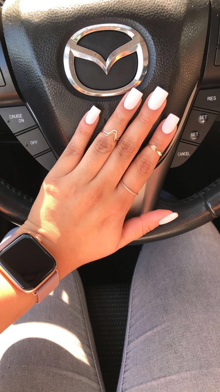 Chic Square-Shaped Nails with White Polish and Trendy Accessories