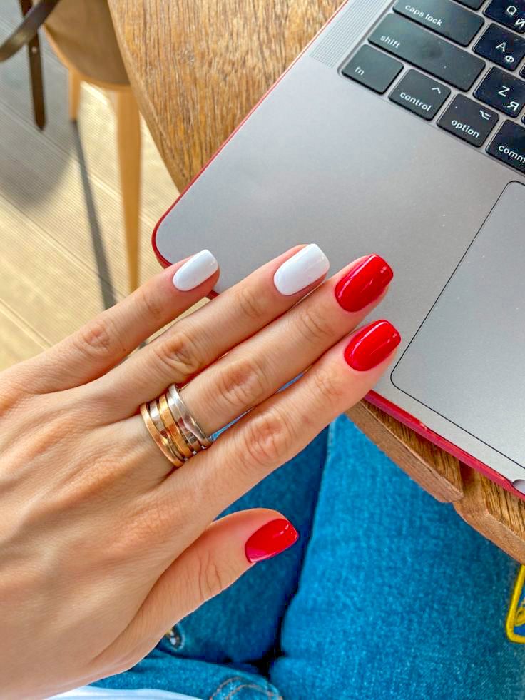 Chic Red and White Nail Design: A Bold and Sophisticated Look.