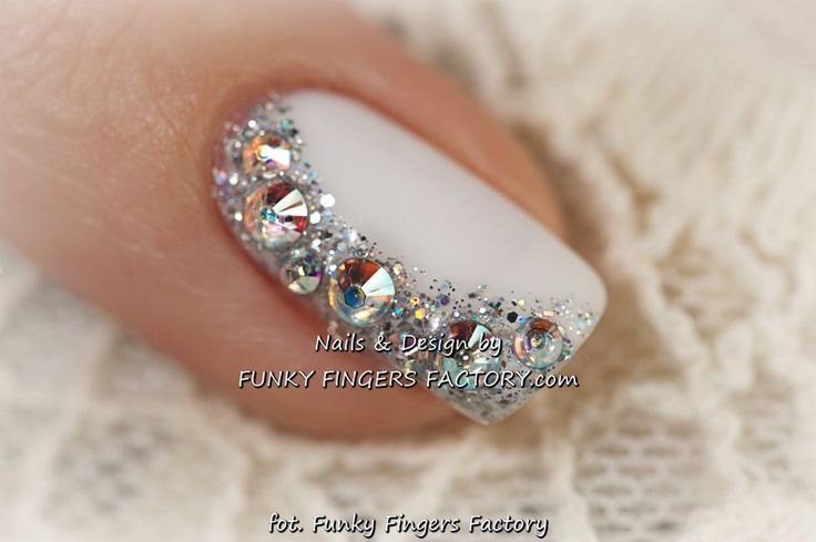 Chic White Glitter Nail Design with Rhinestone Accents for Special Occasions