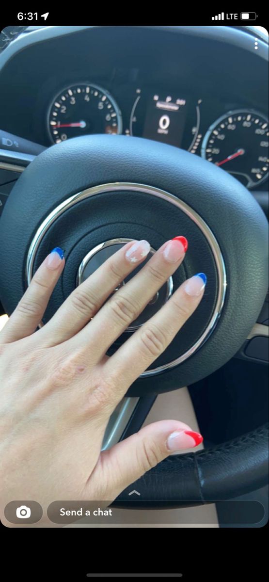 Festive Red, White, and Blue Nail Design for Patriotic Celebrations.