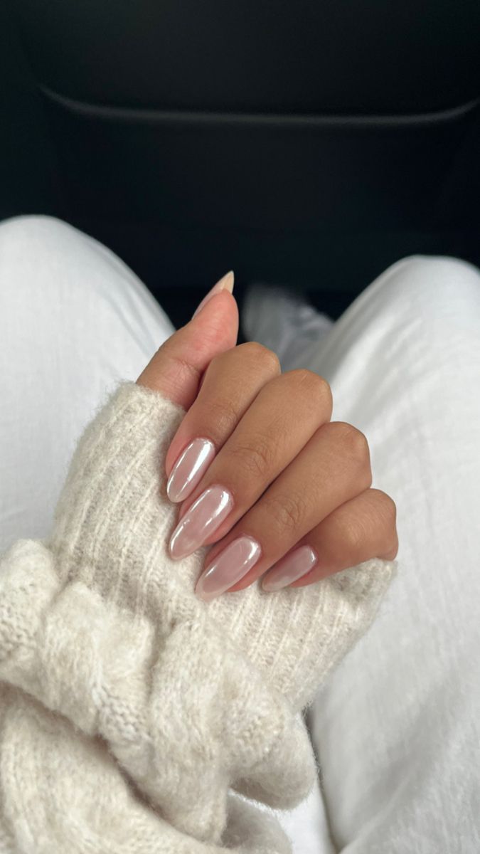 Chic Almond-Shaped Nails in Glossy Neutral Pink: A Sophisticated Yet Cozy Look