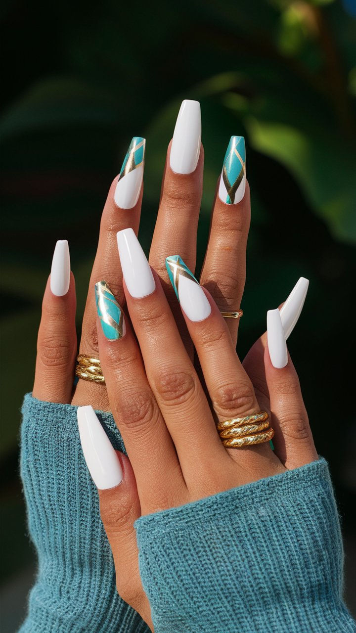 Elegant White Manicure with Geometric Turquoise and Gold Accent Nails.