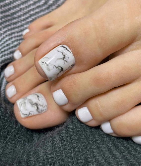 Sophisticated Marble Effect Toe Nail Design for Versatile Style