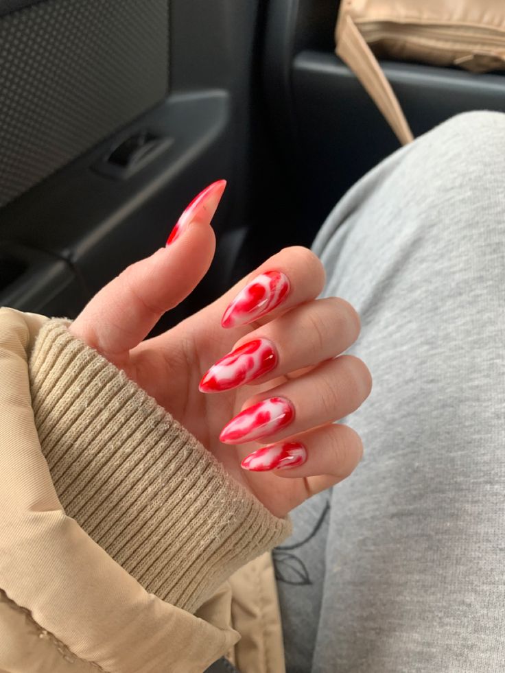 Bold Red and White Marbled Nail Design with Edgy Sharp Shape and Gradient Effect