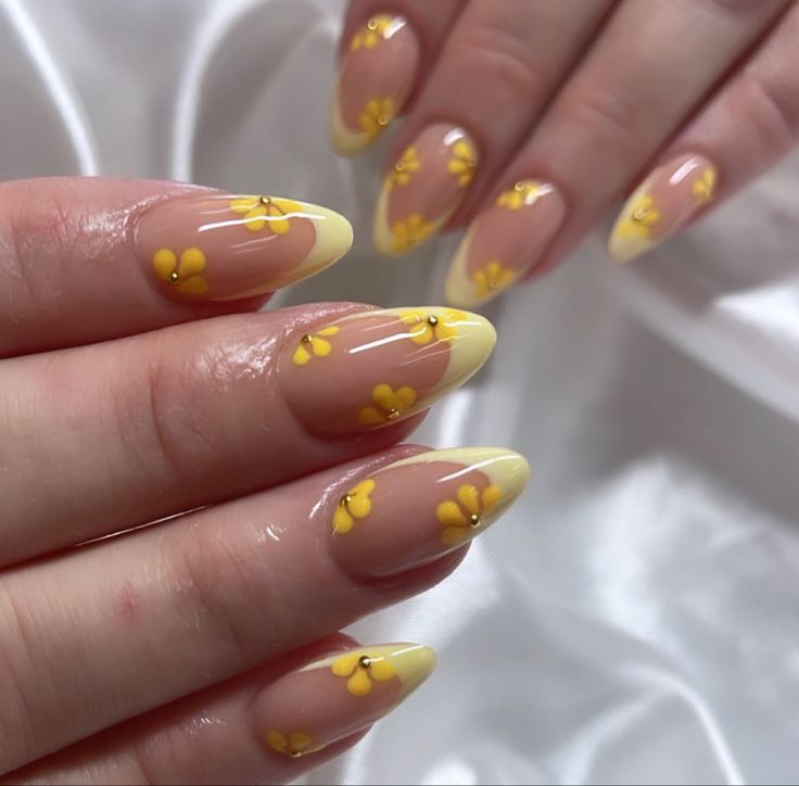 Delicate Flower-Inspired Nail Design with Soft Yellow Tips for a Playful Summer Vibe.