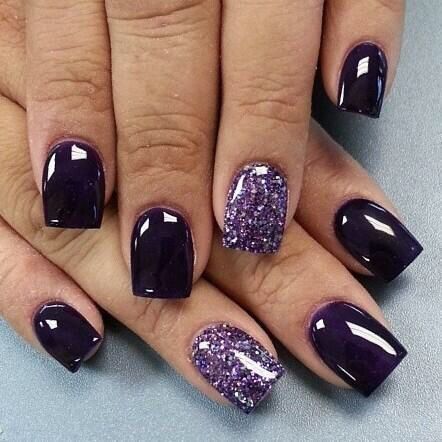 Elegant Deep Purple Nail Design with Glossy and Glitter Finishes.