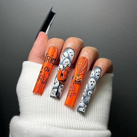 Vibrant Halloween Nail Art with Ghosts, Spider Webs, and Pumpkins