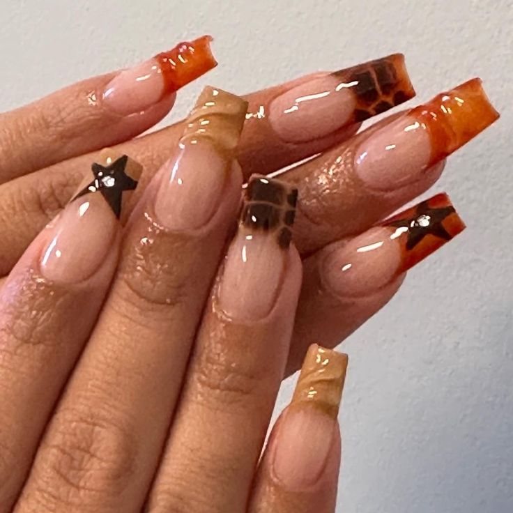 Chic Ombre Nail Design: Caramel to Amber with Star Accents