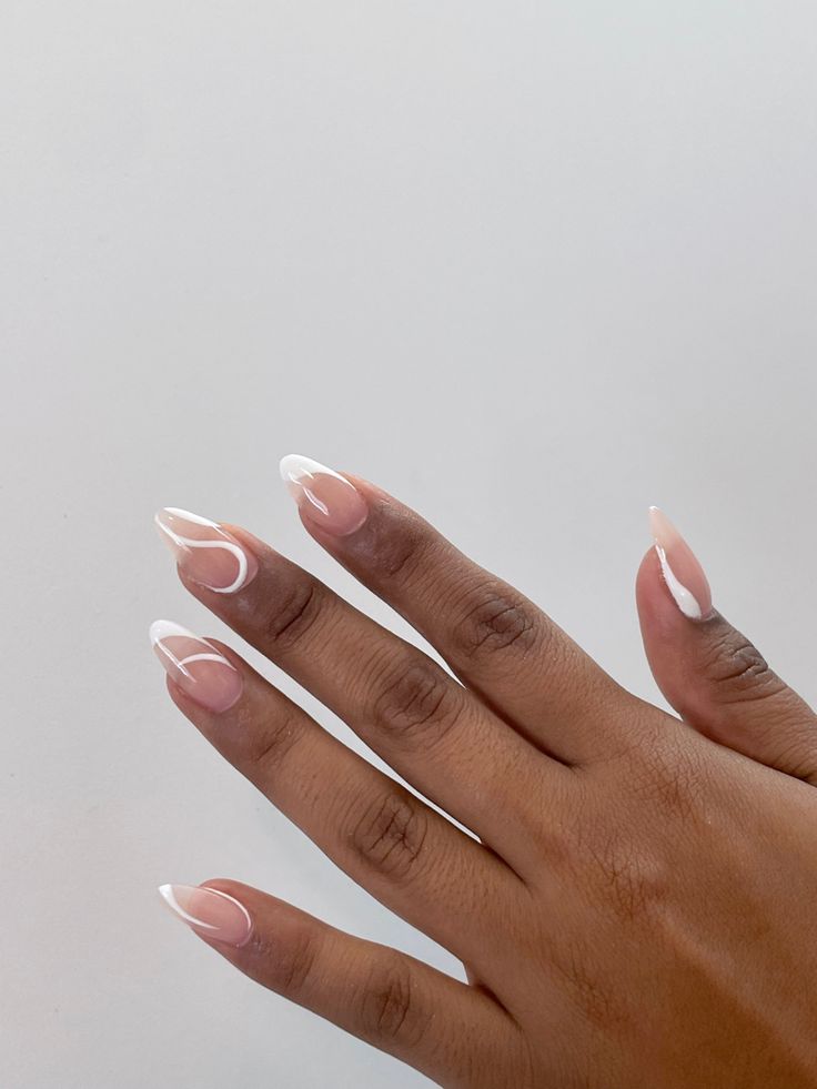 Modern French Tip Nail Design with Artistic Curved Accents.