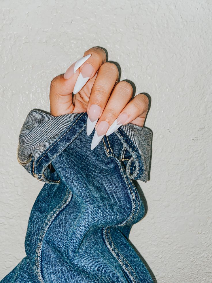 Chic White Ombre Stiletto Nails: Elegant Accent for Casual Denim Outfits.