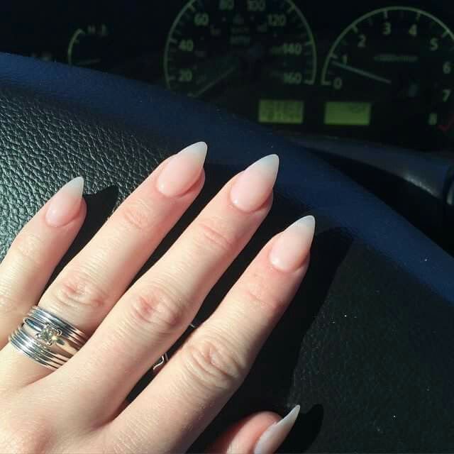 Chic Stiletto Nails with Soft Ombre and Elegant Silver Rings