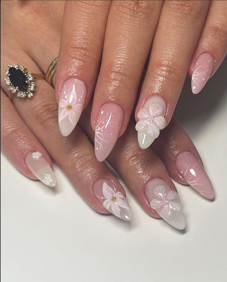 Delicate Floral Nail Design in Soft Pink and White for a Fresh Feminine Aesthetic.