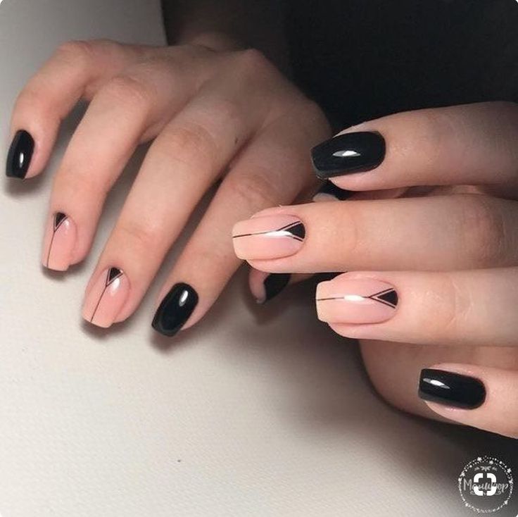 Sophisticated Nail Design: Matte Black and Soft Nude with Geometric Accents