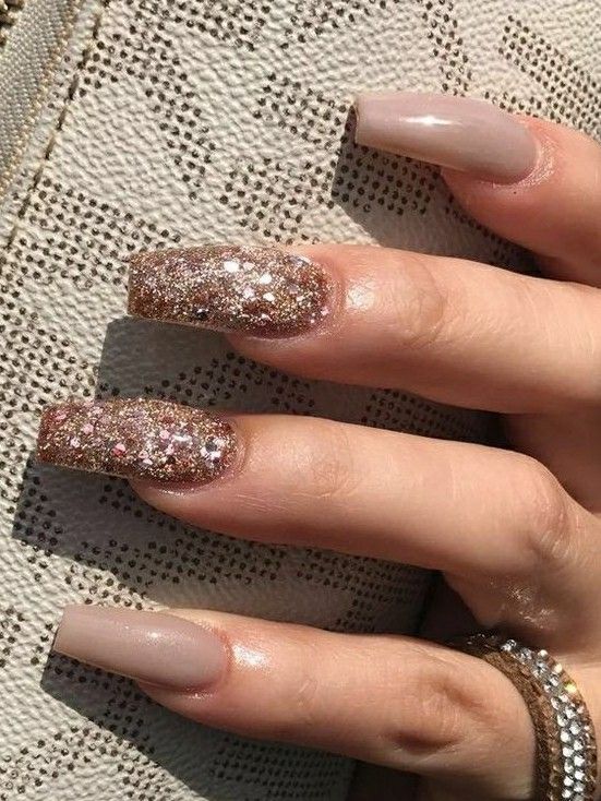 Elegant Nude Nail Design with Glittering Rose Gold Accents