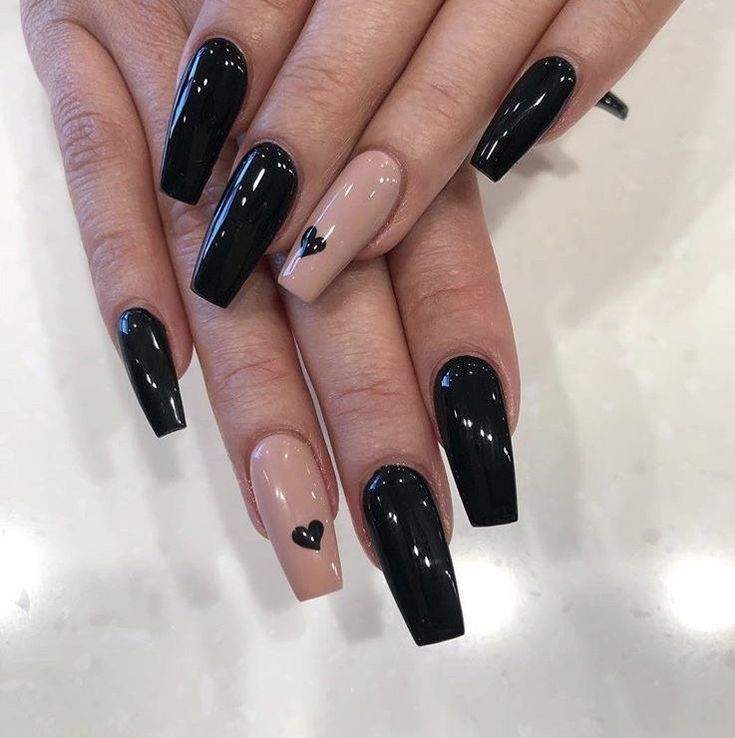 Elegant Nail Design: Glossy Black and Subtle Nude with Heart Accent