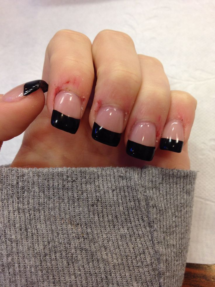 Sophisticated Black-Tipped Nails: A Bold Twist on Classic Elegance.