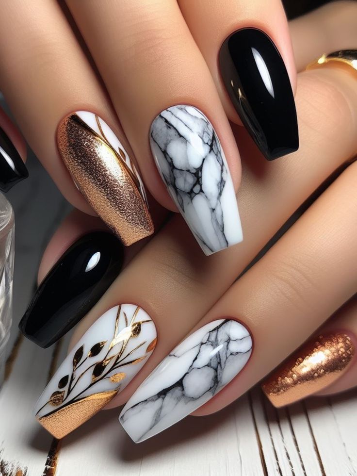 Chic Elegant Nail Design with Glossy Black, Shimmering Gold, and Marble Patterns