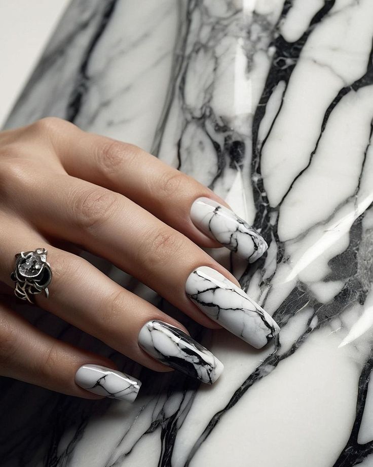 Sophisticated Black and White Marble Nail Art for Chic Elegance.