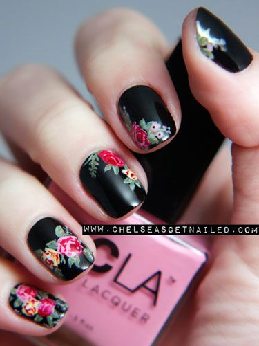 Elegant Floral Nail Art on Matte Black Background