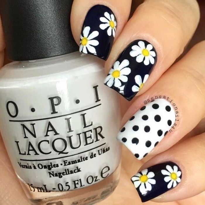 Vibrant Floral Nail Design: Daisies on Navy with Playful Polka Dots