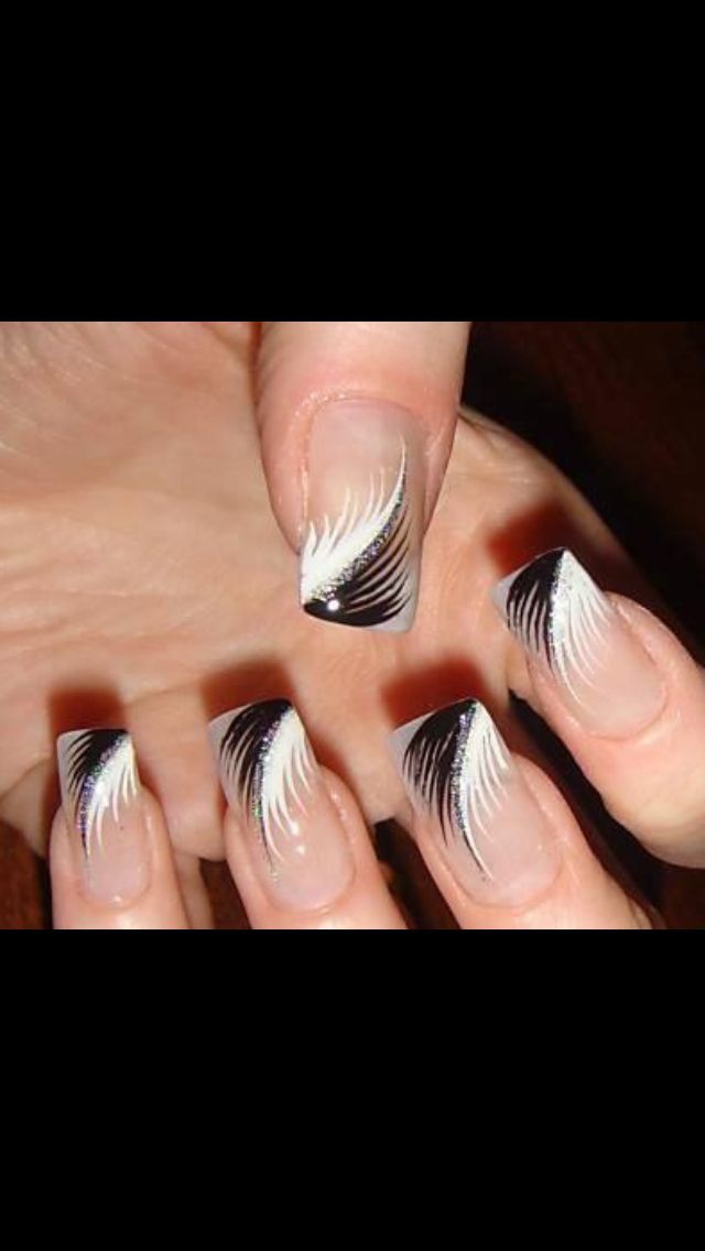 Sophisticated Black and White Nail Design with Intricate Feather Patterns