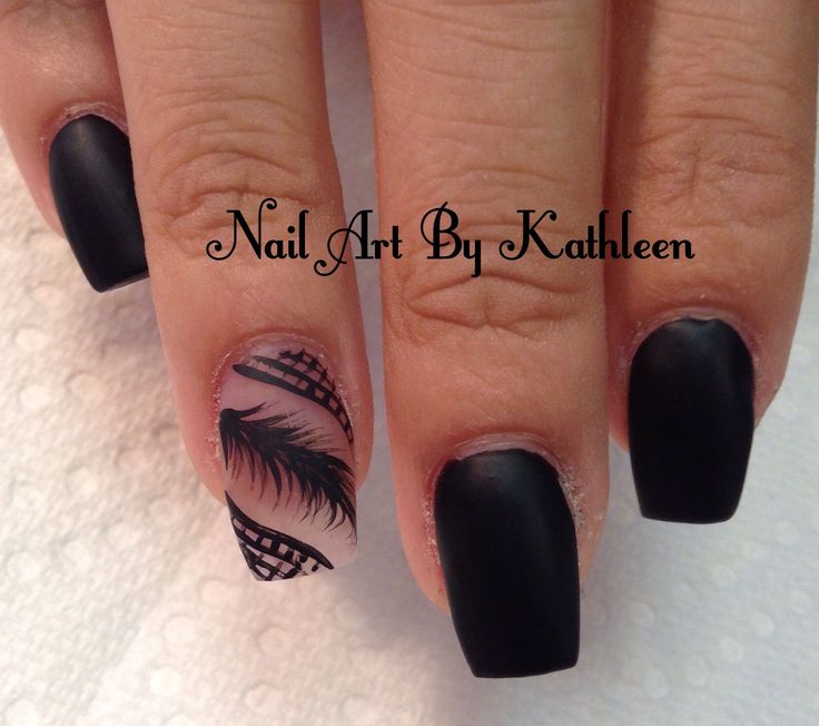 Elegant Matte Black Nails with Artistic Feather Accent for a Sophisticated Look.