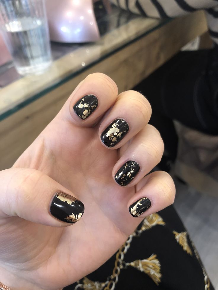 Bold Black and Gold Nail Design: A Versatile Blend of Elegance and Texture