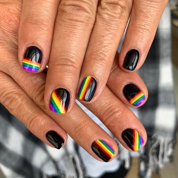 Vibrant Rainbow Striped Nail Design on Bold Black Base