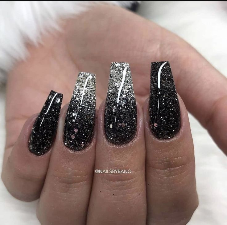 Stunning Black and Silver Glitter Ombre Nails for Glamorous Occasions.