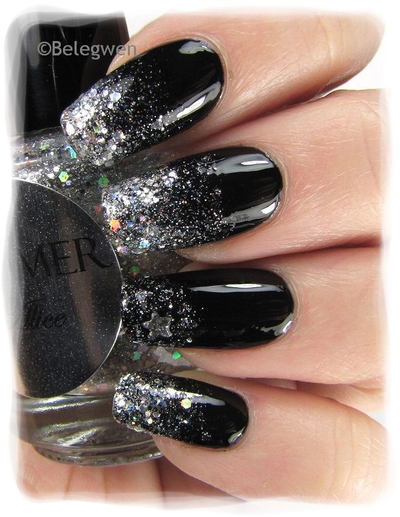 Elegant Black Gradient Nails with Glittering Silver Accent