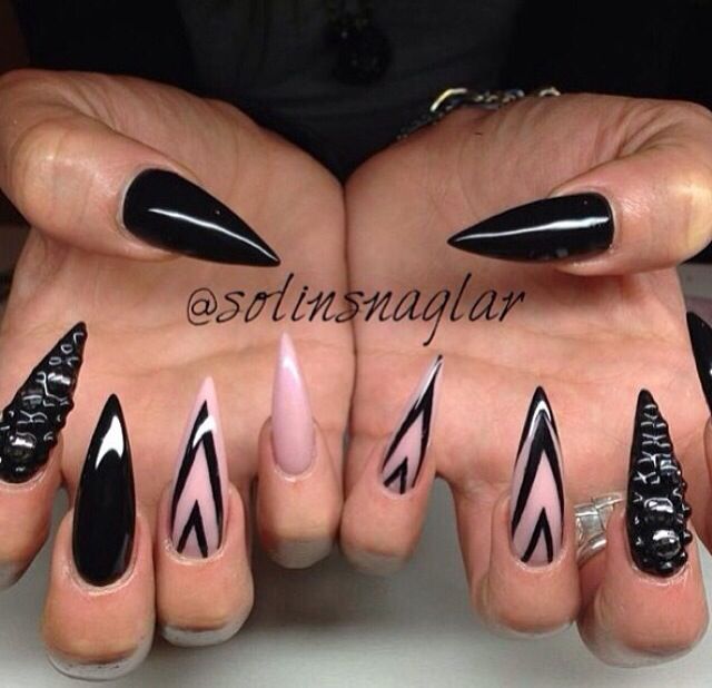 Chic Bold Nail Design: Glossy Black and Soft Pink with Geometric Patterns and Textured Accents.