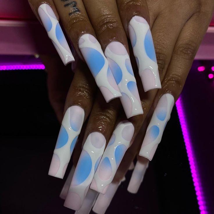 Playful and Modern Abstract Nail Design in Vibrant White, Pink, and Blue Hues