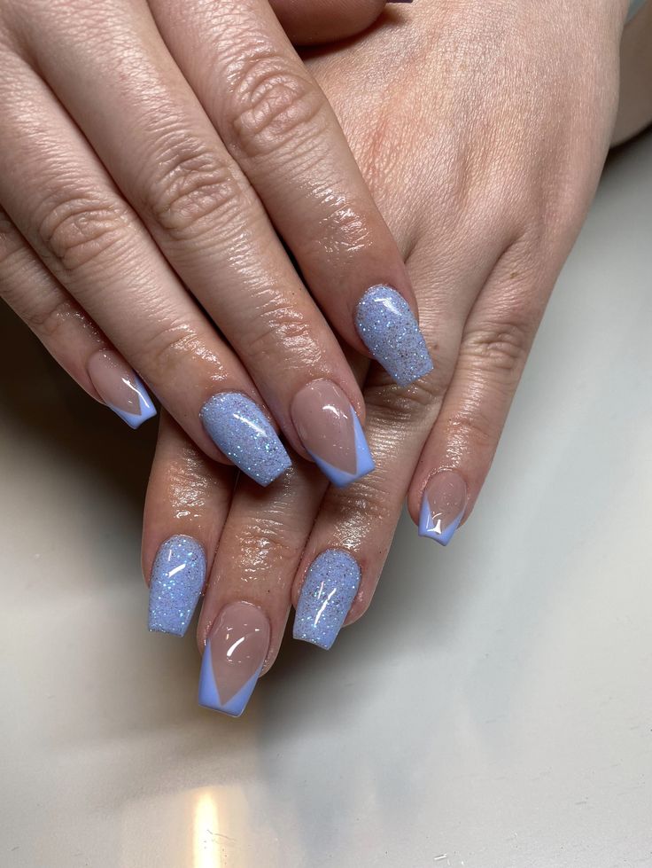 Chic Glittery Blue Nail Design with Square and Almond Shapes