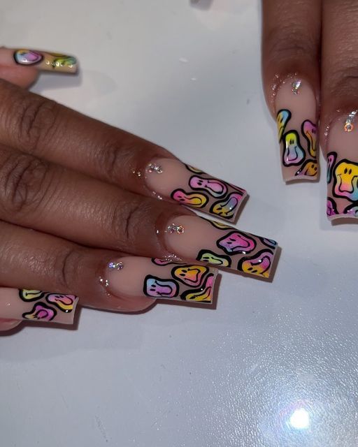 Playful Pastel Abstract Nail Design with Glamorous Accents on Nude Background