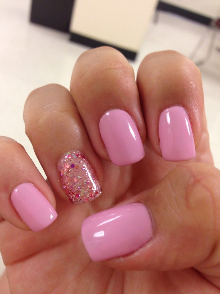 Elegant Chic Nail Design: Soft Pink Base with Glitter Accent