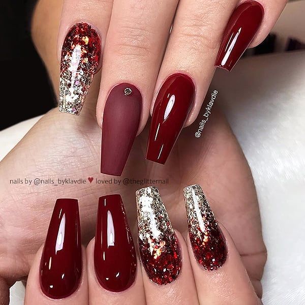 Sophisticated Burgundy Nail Design with Glamorous Glitter Accents.