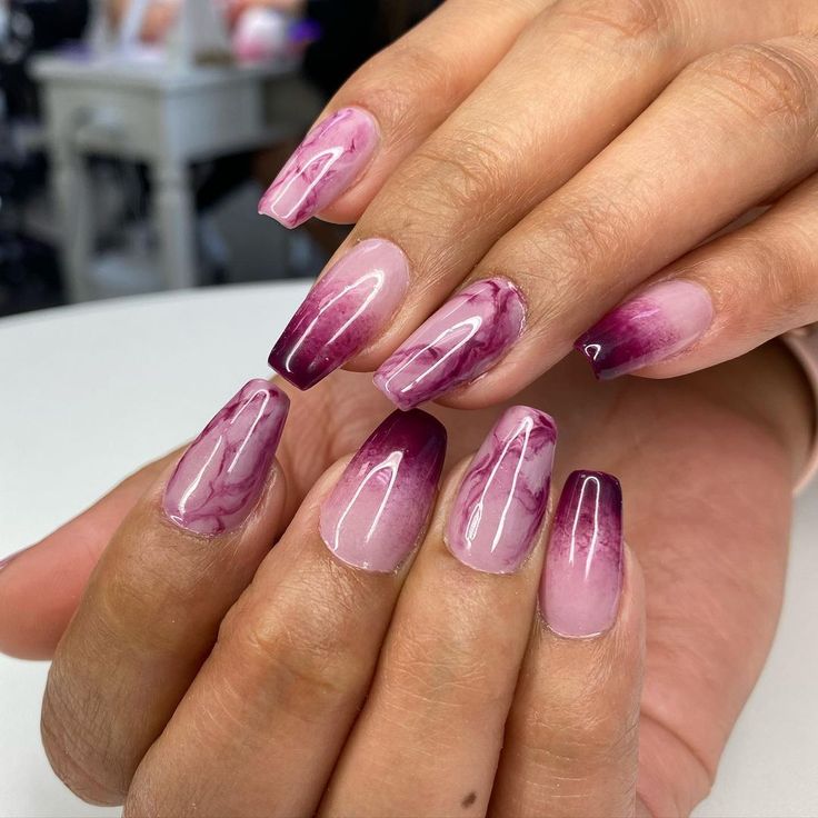 Sophisticated Ombre Nail Design with Rich Purples and Marble Accents