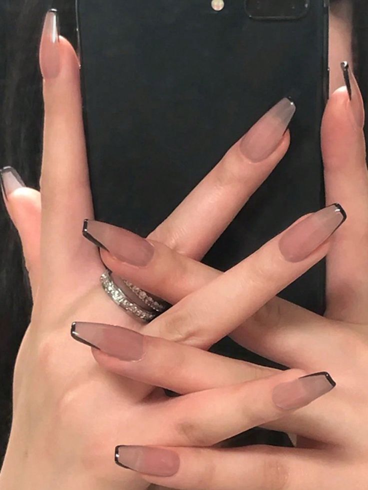 Chic Long Tapered Nails with Nude-to-Black Gradient and Stylish Finishes