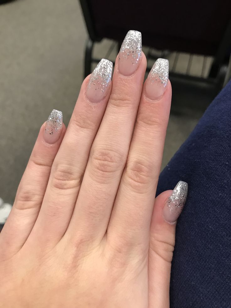 Sophisticated Nail Design with Shimmering Silver Tips for Glamorous Flair.