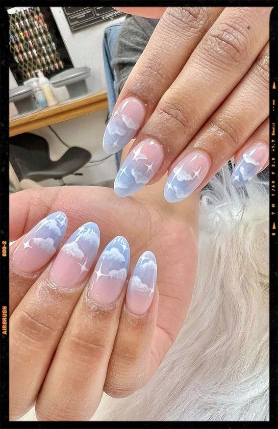 Dreamy Sky Motif Nail Design with Gradient Colors and Sparkling Accents.