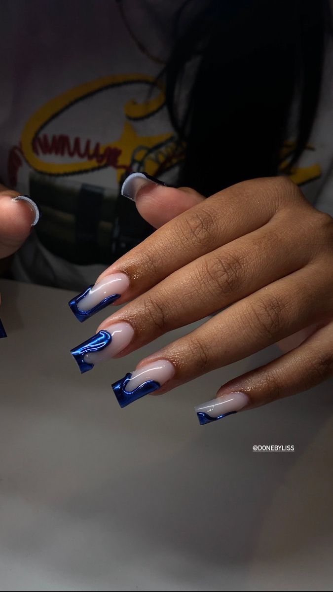 Bold Blue-Outlined Nail Art: A Modern Twist on Classic Styles