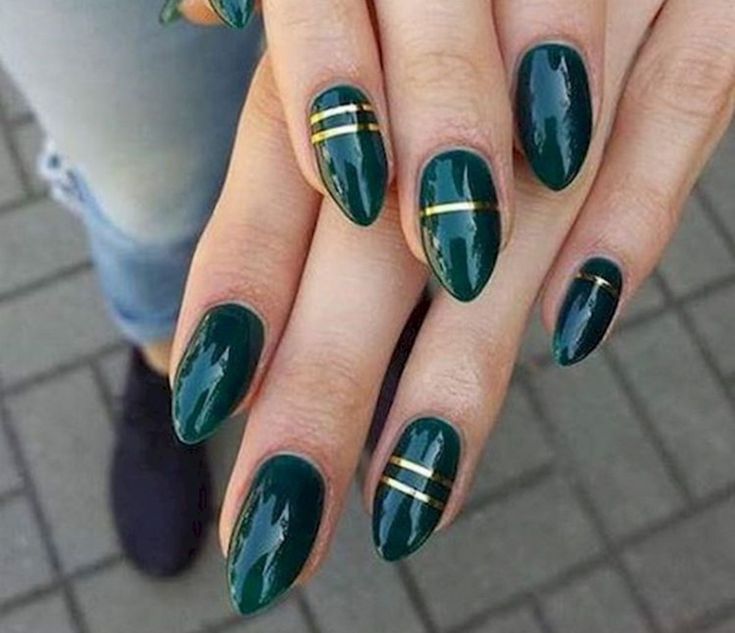 Chic Elegant Green Nails with Glossy Finish and Gold Accents for Sophistication.