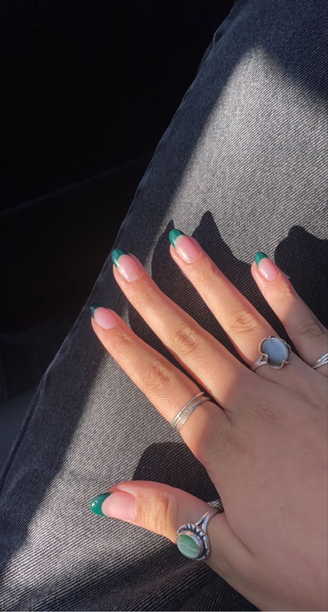 Modern French Manicure: Soft Pink Base with Vibrant Green Tips for a Polished and Playful Aesthetic.