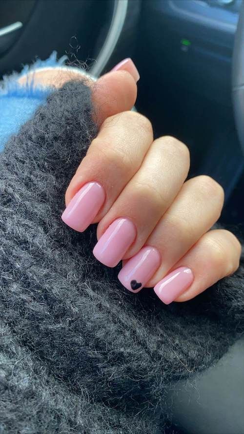 Elegant Pink Nailswith Whimsical Black Heart Accent