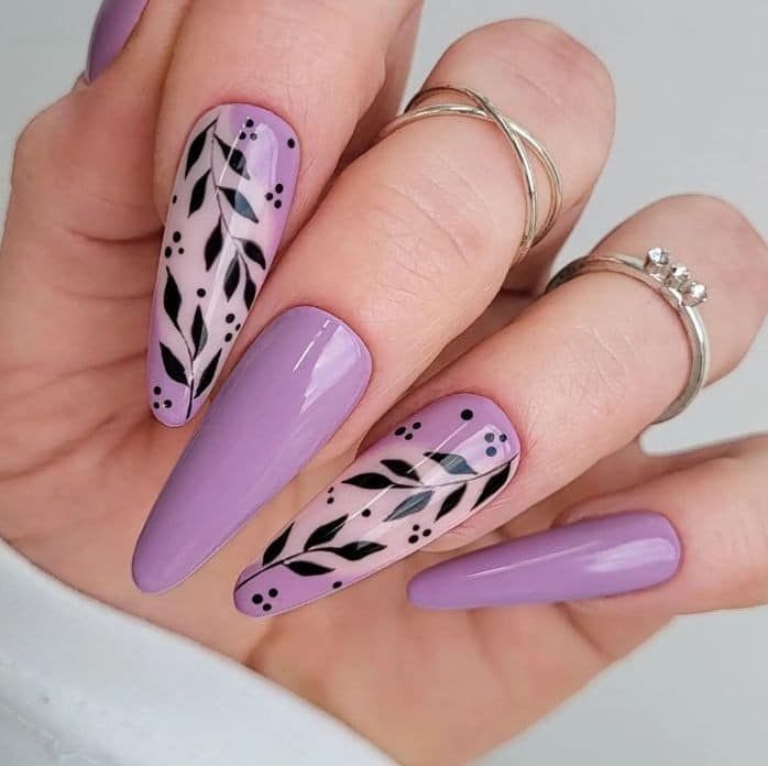 Sophisticated Lavender Nail Design with Intricate Black Leaf Patterns