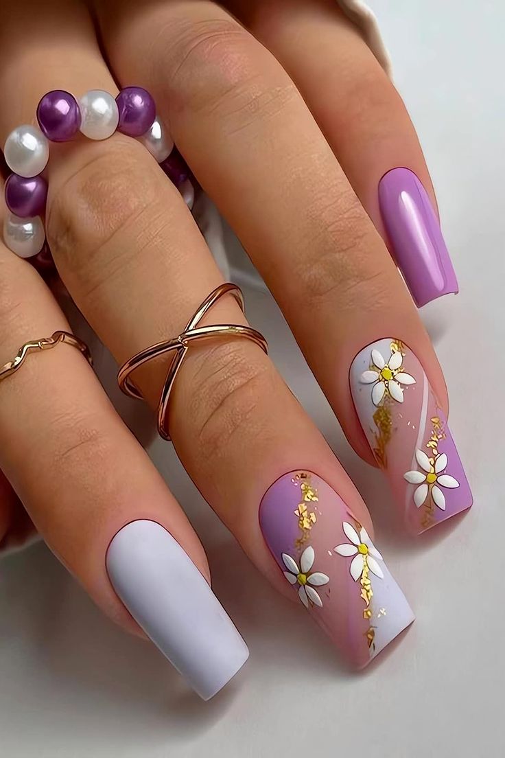 Sophisticated Spring-Inspired Lavender and White Nail Design with Hand-Painted Daisies and Gold Accents.