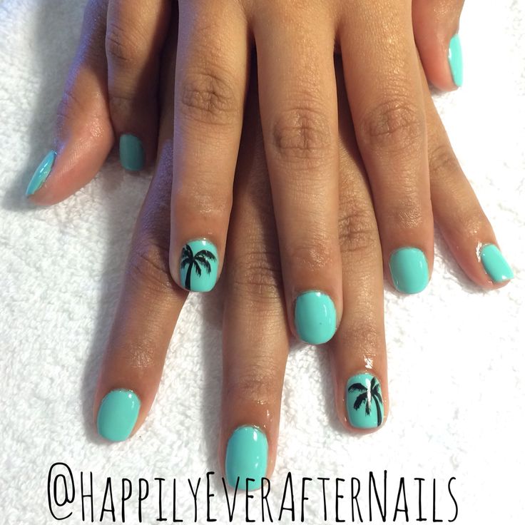 Tropical Nail Design with Vibrant Turquoise Base and Palm Tree Accents for a Summery Beach Vibe.