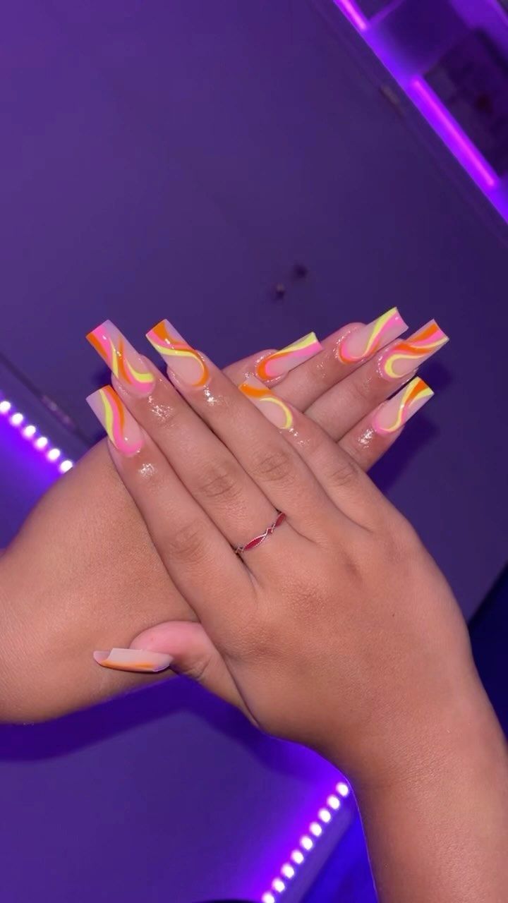 Vibrant Summer Nail Design with Long Square Tips and Glossy Swirl Pattern