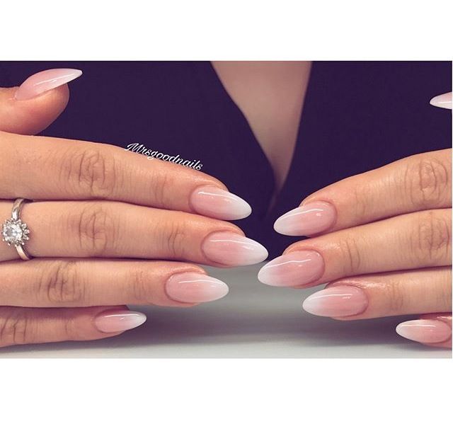 Sophisticated Almond-Shaped Ombre Nails with Sparkling Ring Elegance.