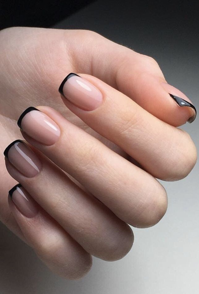 Sophisticated Elegant Nude Nails with Black French Tips and Unique Accent